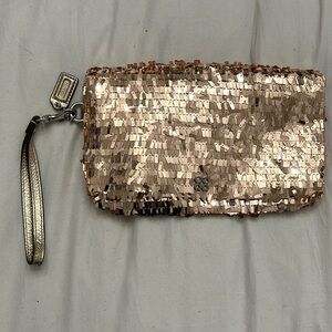 coach sequins rose gold wristlet clutch